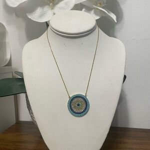 Elegant Gold and Blue Pendant Necklace
